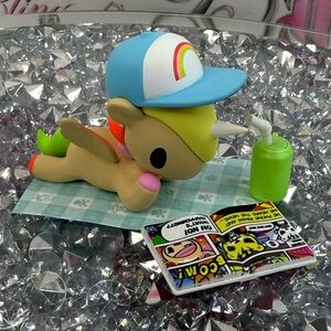 tokidoki comic cutie Mini Figurine with Light Blue Hat and Neon Green Bottle